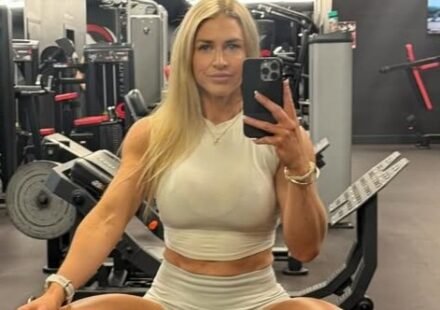 Elise Fulcher in the gym wearing a white outfit