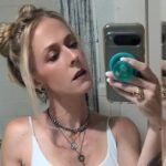 Carmilla Vess taking a hot selfie in her bathroom mirror